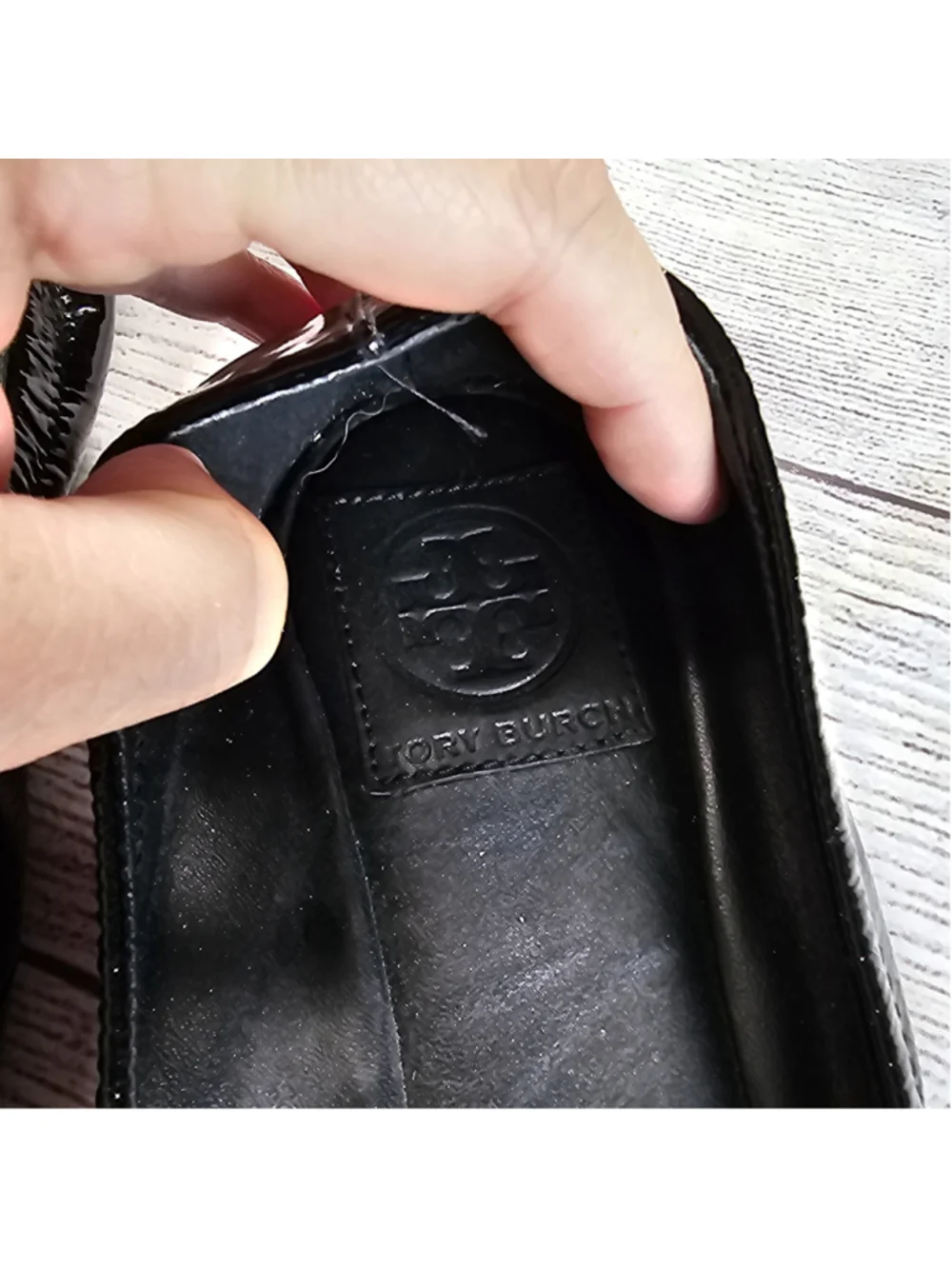 Tory Burch 10M shiny black ballerina flats with black and gold bow accent